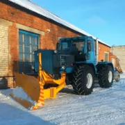 Бульдозерное оборудование колёсного трактора Т-150К механический поворот